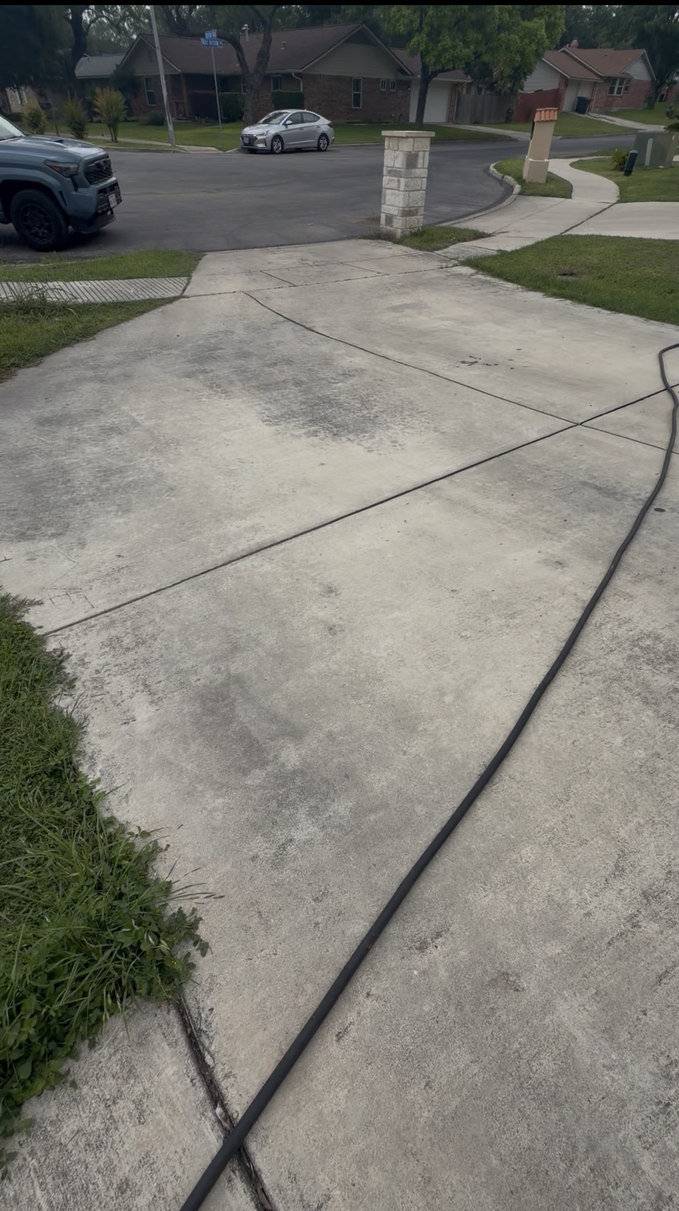 Dirty driveway before power washing